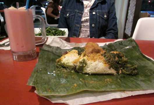 Nasi Bunkus - it comes wrapped in a banana leaf